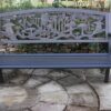 Steel framed cast iron bench with fairies