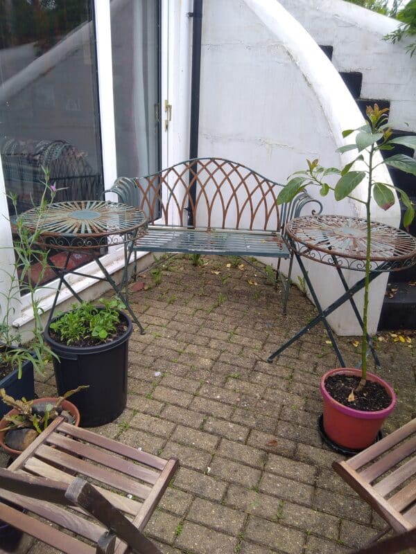 A pair of rusty garden tables found in a lay-by.