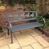 Cast iron bench with running horses